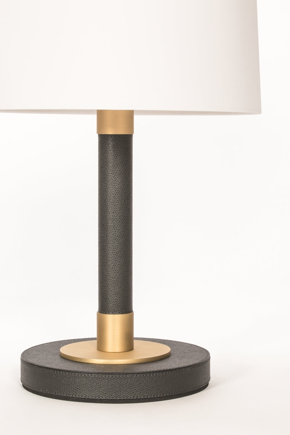 Gallia Table Lamp by Giobagnara | Leather-Covered Wood Structure with Metal Inserts | Fine White Cotton Lampshade with Fireproof Diffuser | In-Line Foot Switch for Convenient Operation | Elevate Your Interior with Style and Functionality