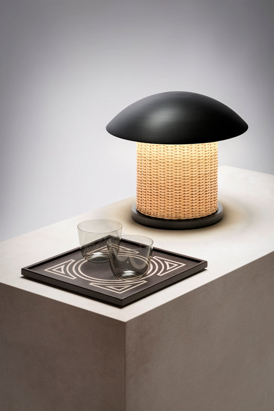 Giobagnara x Stéphane Parmentier Duomo Table Lamp | Vintage-inspired Design with Modern Minimalism | Sculptural Appearance with Geometrical Volumes | Crafted with Curved Bronze Lampshades and Woven Rattan Bases | Casts Soft Ambient Light for Reading and Lounging | Available at 2Jour Concierge, #1 luxury high-end gift & lifestyle shop