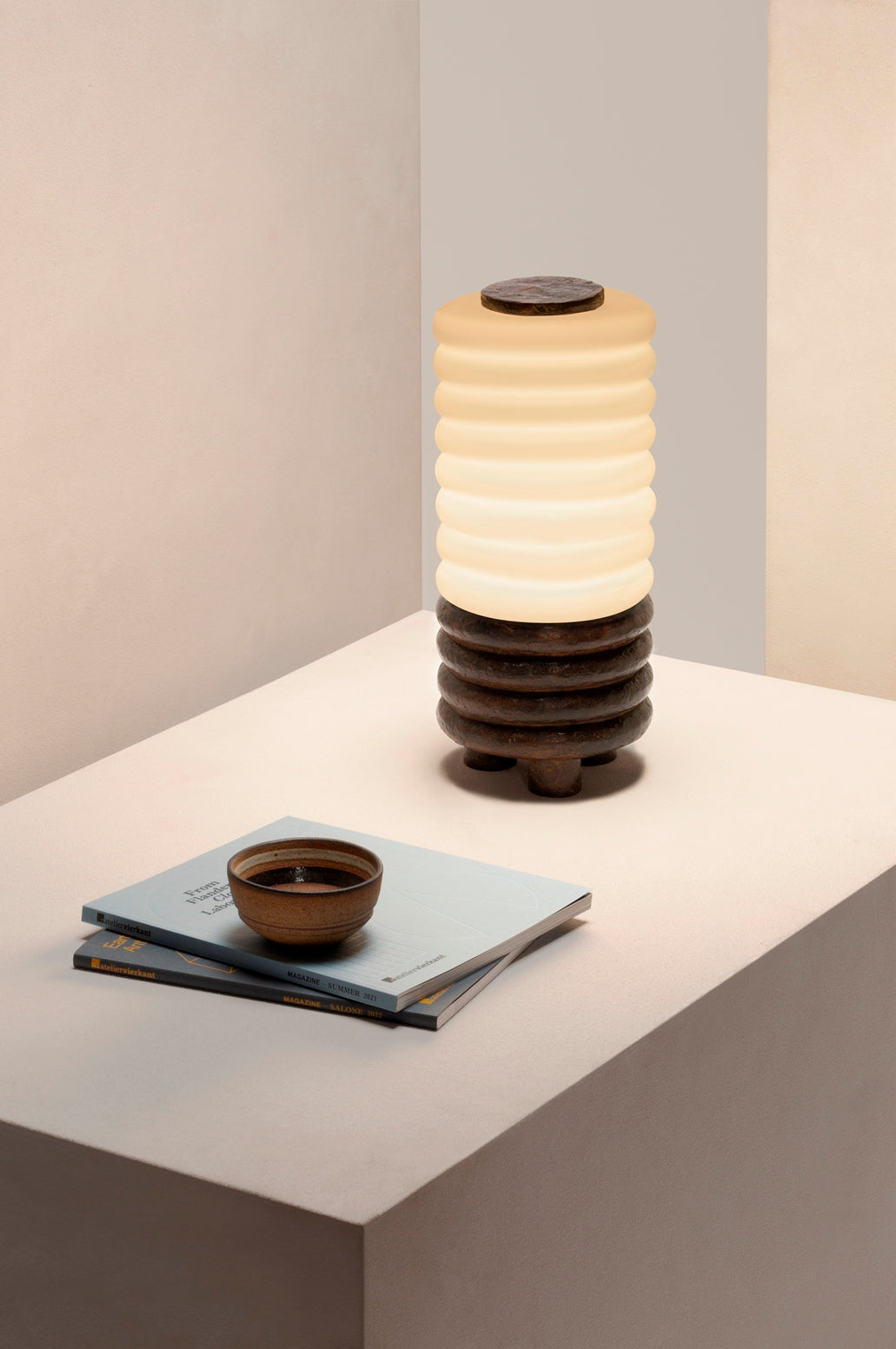Giobagnara x Stéphane Parmentier Scala Table Lamp With Burnished Bronze Base | Inspired by Italian Architecture and Salvatore Ferragamo’s Heel | Features a Burnished Sandblasted Bronze Base and Opal Glass Lampshade | Elevate Your Space with Architectural Elegance | Available at 2Jour Concierge, #1 luxury high-end gift & lifestyle shop