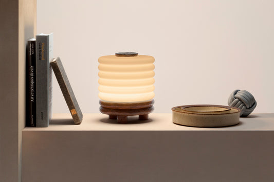 Giobagnara x Stéphane Parmentier Scala Table Lamp With Burnished Bronze Base | Inspired by Italian Architecture and Salvatore Ferragamo’s Heel | Features a Burnished Sandblasted Bronze Base and Opal Glass Lampshade | Elevate Your Space with Architectural Elegance | Available at 2Jour Concierge, #1 luxury high-end gift & lifestyle shop