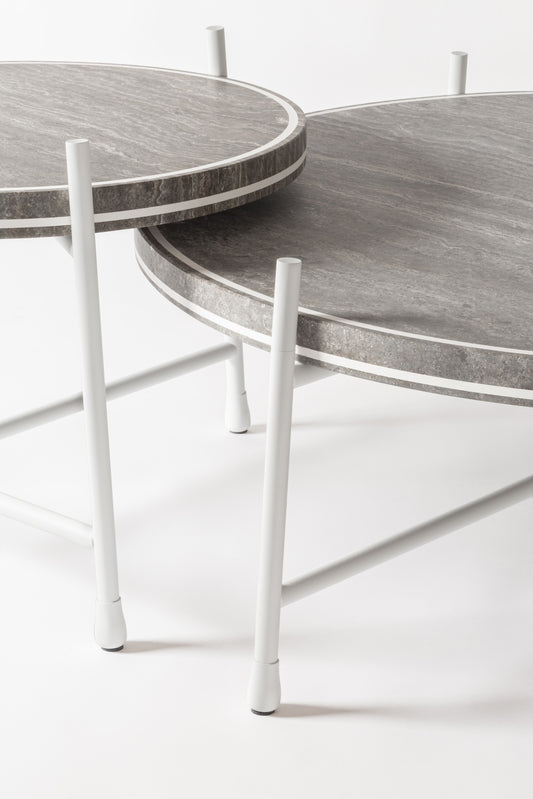Giobagnara × Stéphane Parmentier Oblivion | Round Travertine Coffee Table: Travertine top with slim metal legs in bronze or white, available in classic or titanium finishes | Furniture / Coffee Tables | 2Jour Concierge, your luxury lifestyle shop | luxury interiors, elegant living, hospitality décor, boutique hotels, yacht décor, executive offices, refined lifestyle