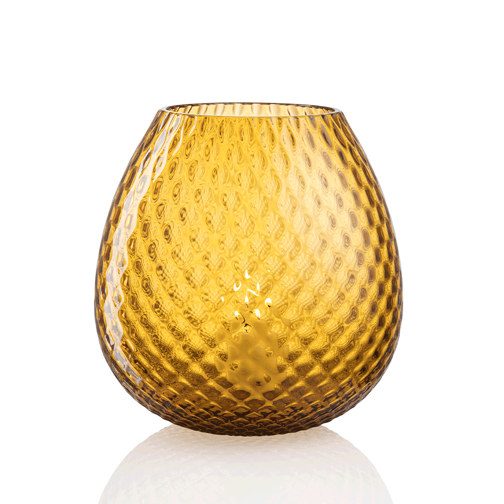 NasonMoretti Macramè candle holders – XL & XXL | Statement pieces handcrafted in Murano glass with refined "balloton" texture | Available in a bold color palette including amber, grey, brown, ruby red, soraya green, and violet | These oversized candle holders bring a sculptural elegance and vibrant glow to any space | Design by NasonMoretti | Home decor & candle holders | 2Jour Concierge, your luxury lifestyle shop