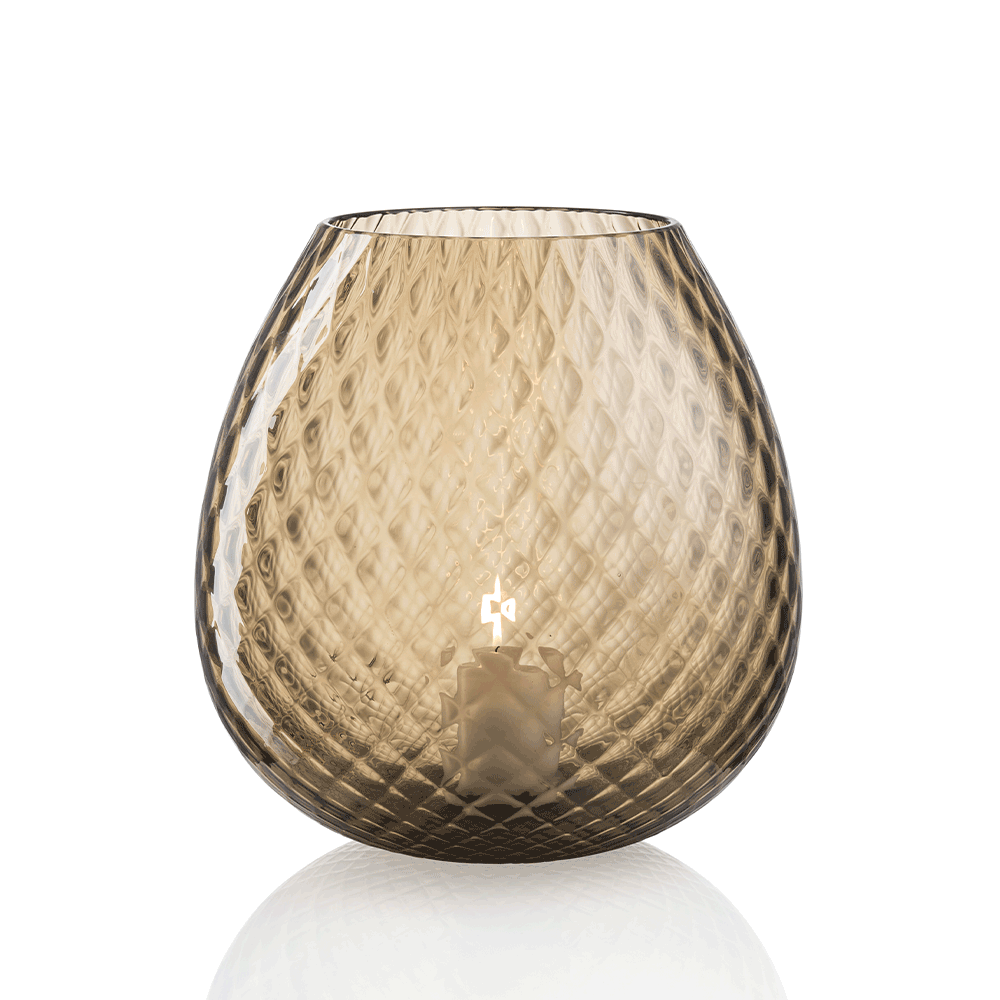 NasonMoretti Macramè candle holders – XL & XXL | Statement pieces handcrafted in Murano glass with refined "balloton" texture | Available in a bold color palette including amber, grey, brown, ruby red, soraya green, and violet | These oversized candle holders bring a sculptural elegance and vibrant glow to any space | Design by NasonMoretti | Home decor & candle holders | 2Jour Concierge, your luxury lifestyle shop