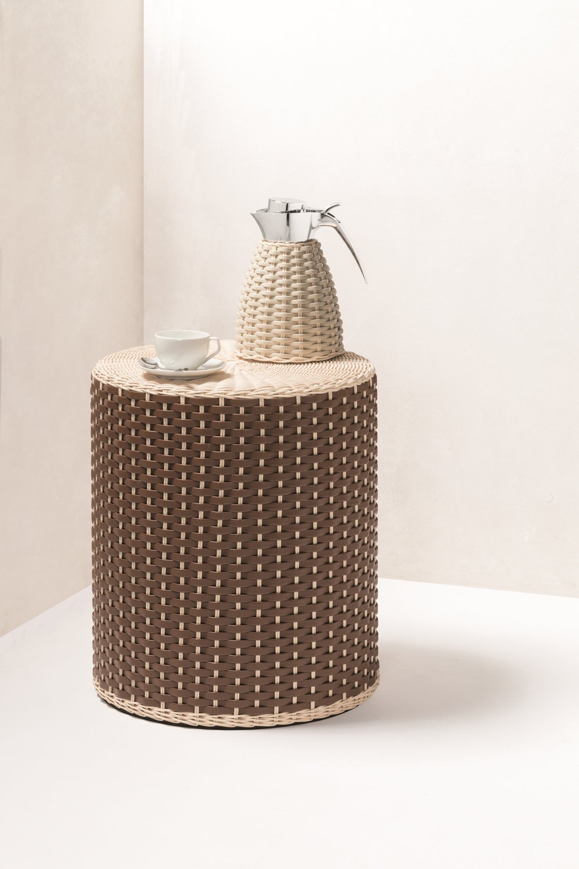 Pigment France Arles Leather & Rattan Carafe | Insulated stainless steel carafe with chrome-plated finish, partially covered in woven leather and rattan | Two-chamber glass structure maintains warm temperatures for up to 12 hours and cold temperatures for up to 24 hours | Features a specially developed lid for precise, one-hand pouring | Home Decor and Serveware | 2Jour Concierge, your luxury lifestyle shop