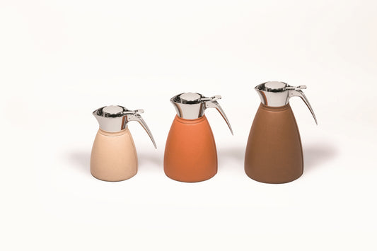 Vincennes Carafe by Pigment France | Partially leather-covered insulated stainless steel carafe with chrome-plated finish. Two-chamber structure maintains liquid temperatures. Precise pouring with specially developed hinged lid for one-hand operation. | Tableware and Drinkware | 2Jour Concierge, your luxury lifestyle shop