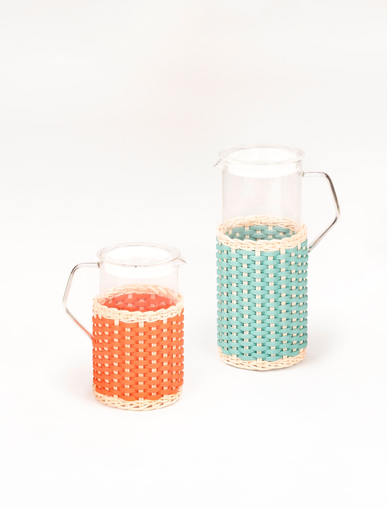 Pigment France Marseille Leather & Rattan Glass Pitcher | Transparent borosilicate glass partially dressed in woven leather and rattan | Features a glass lid with silicone ring and heat-resistant glass body | Suitable for both hot and cold drinks | Home Decor and Serveware | 2Jour Concierge, your luxury lifestyle shop