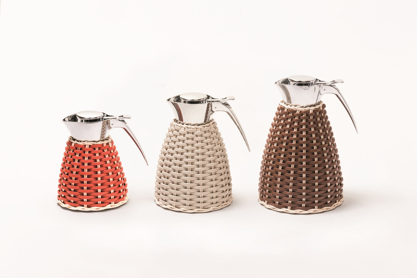 Vincennes Leather & Rattan Carafe by Pigment France | Insulated stainless steel carafe partially covered in woven leather and rattan with chrome-plated finish. Two-chamber structure maintains liquid temperatures. Precise pouring with specially developed hinged lid for one-hand operation. | Tableware and Drinkware | 2Jour Concierge, your luxury lifestyle shop