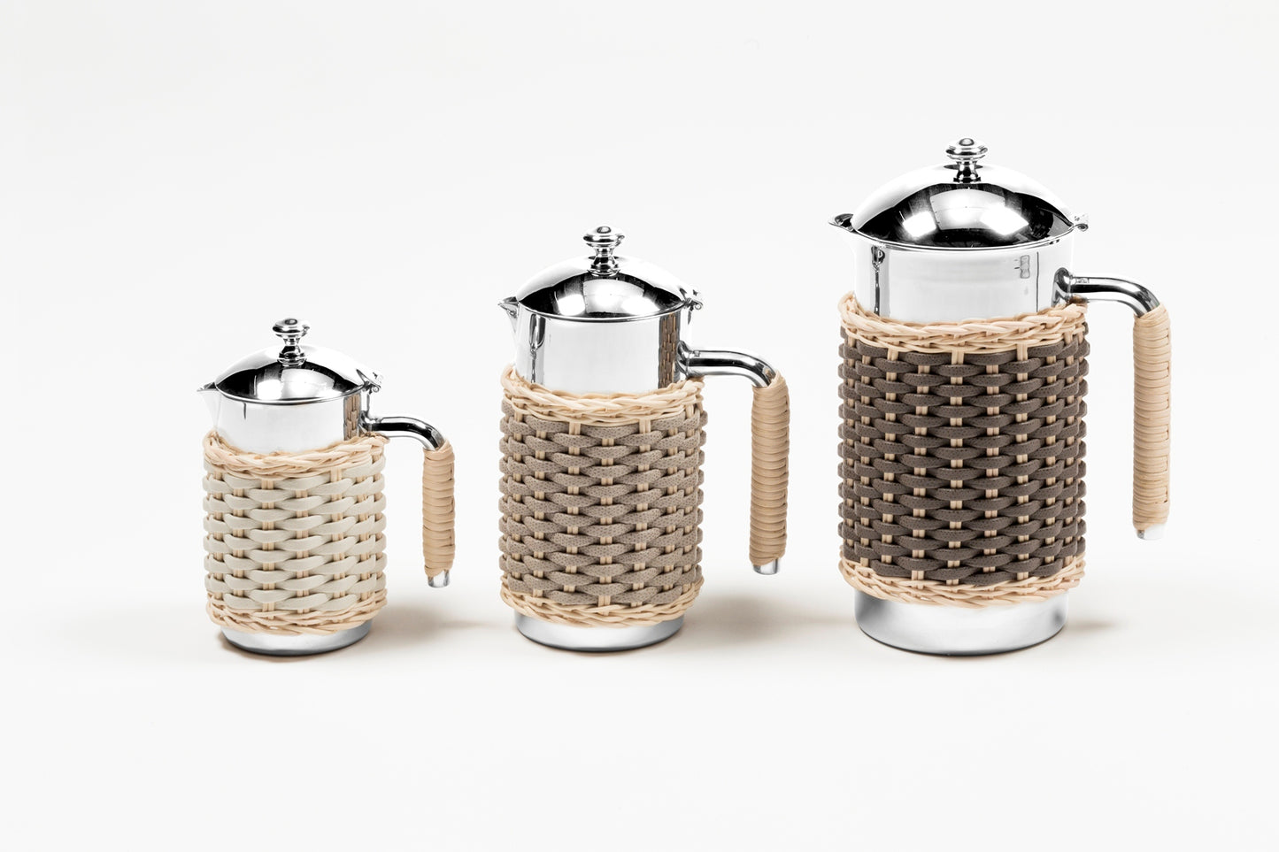 Pigment France Rennes Leather & Rattan Carafe | Insulated stainless steel carafe with chrome-plated finish, partially covered in woven leather and rattan | Two-chamber structure maintains liquid temperature | Elegant and functional design | Home Decor and Serveware | 2Jour Concierge, your luxury lifestyle shop
