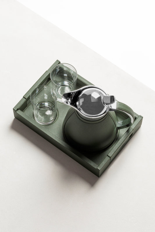 Pigment France Beaubourg Nesting Tray Set | Includes a small Beaubourg tray with dedicated spaces for perfect stability, hosting two fine crystal glasses and one carafe | Compatible with the following carafes: Chantilly 0.6L, Monceau 0.6L, Vincennes 0.6L | Carafes: Partially leather-covered insulated stainless steel with chrome-plated finish | Beaubourg Tray: Leather-covered wood structure | Elegant and functional design | Home Decor and Serveware | 2Jour Concierge, your luxury lifestyle shop