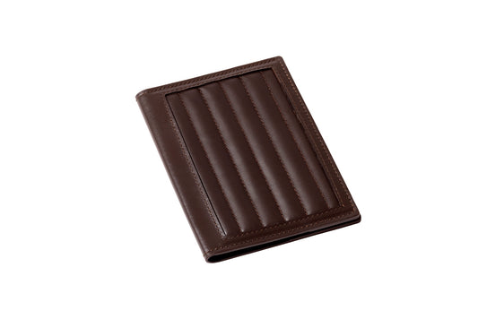 Rivière Lines Passport Holder | Quilted lines padded leather design offering a sleek and modern travel accessory | Travel Accessories | 2Jour Concierge, your luxury lifestyle shop