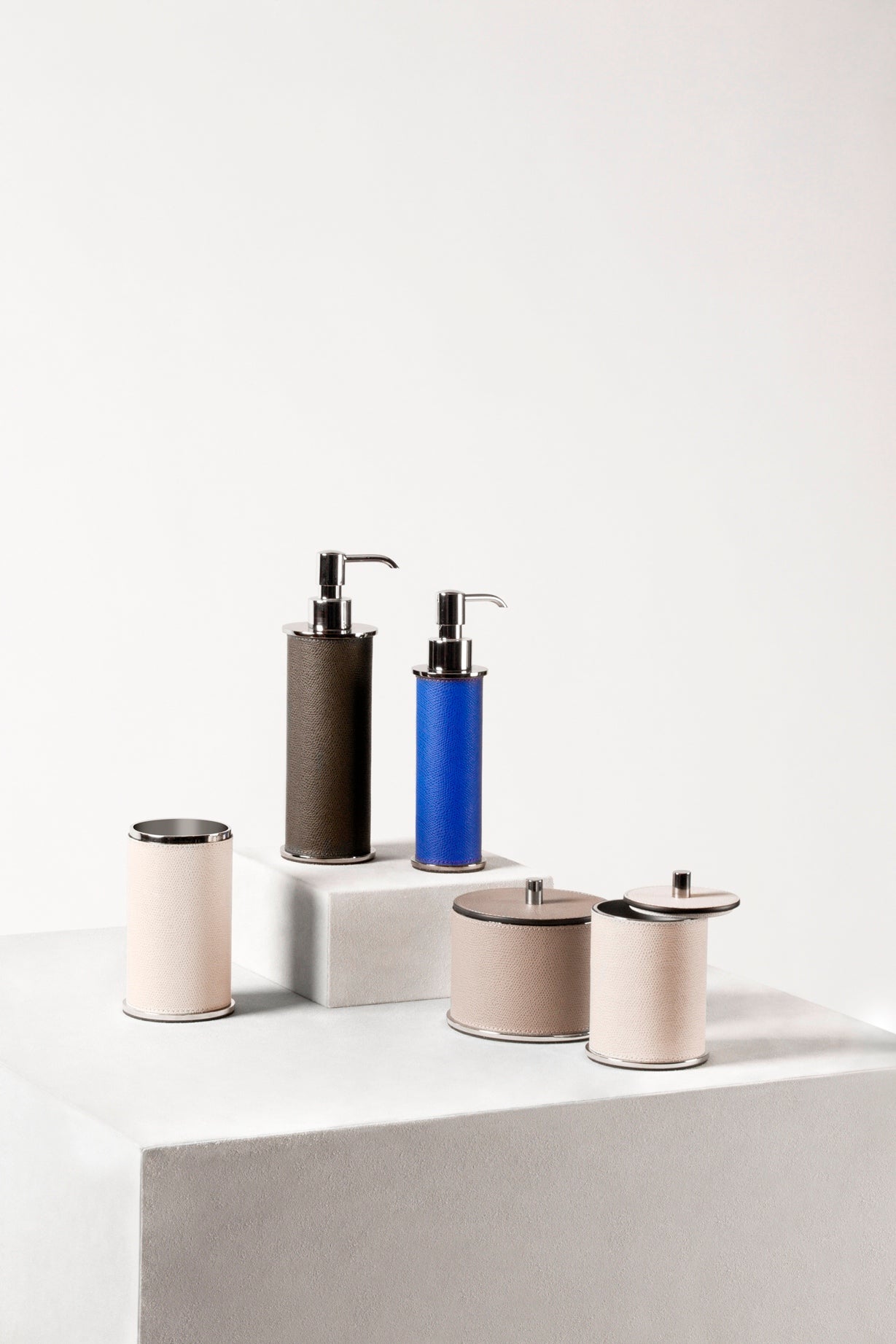 Giobagnara Positano soap dispenser | Elegant leather-covered dispenser available in small or large size | Solid brass structure with matching base and knob | Finished with a non-slip waterproof rubber base | Available in chrome, bronze, or brass finishes | Bathroom accessories | 2Jour Concierge, your luxury lifestyle shop
