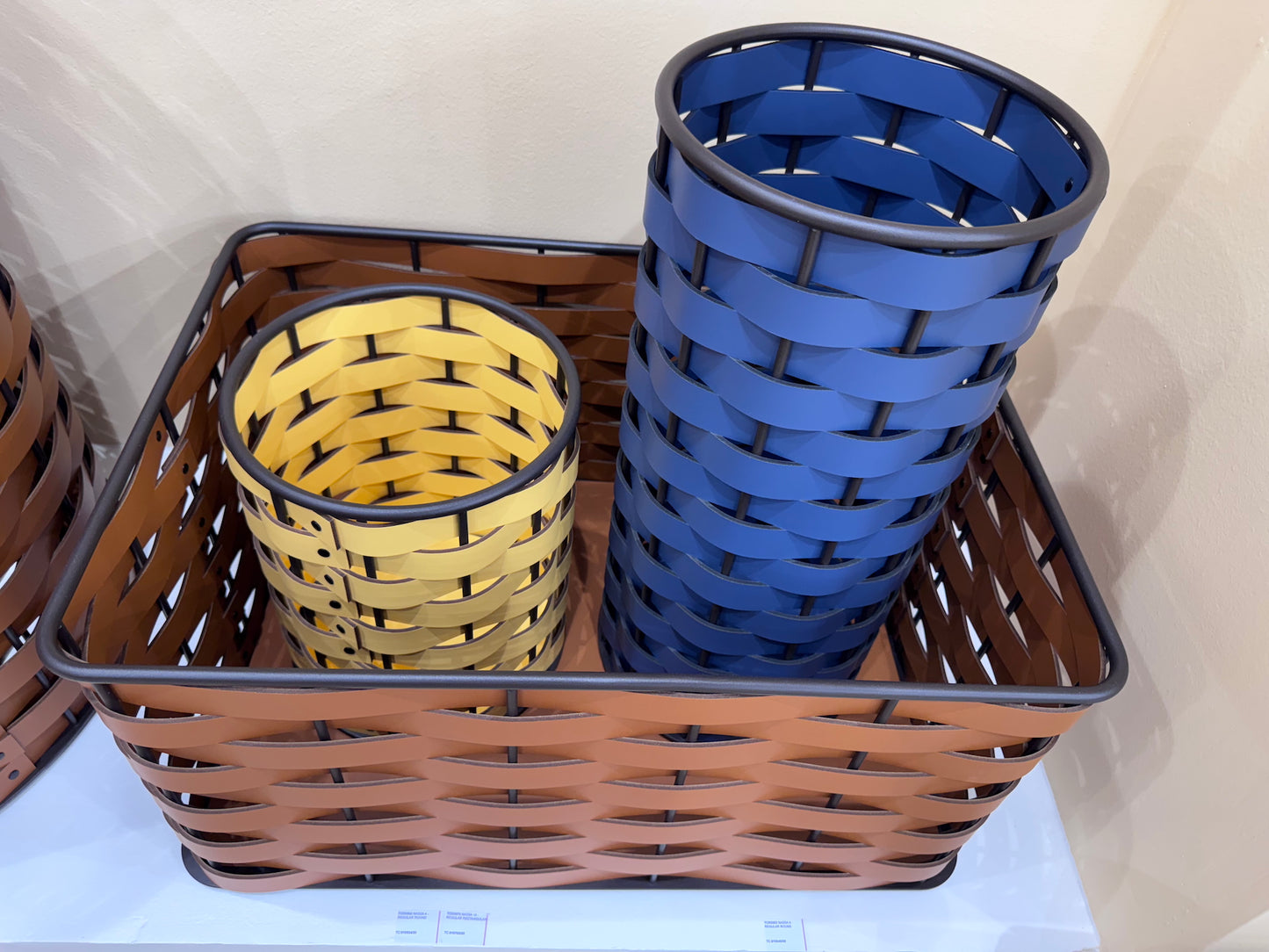 Nassa Storage Basket: Dark-Stained Aluminum Framework, Regenerated Leather Weaving, Round