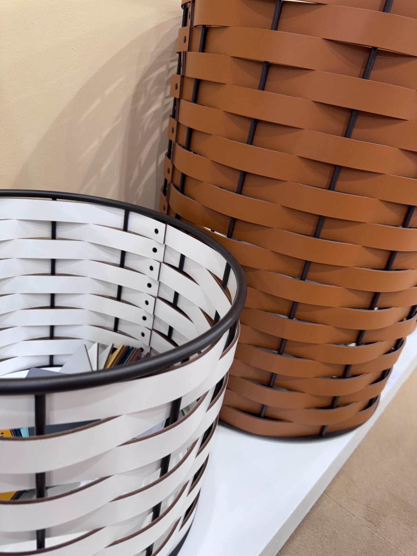Nassa Storage Basket: Dark-Stained Aluminum Framework, Regenerated Leather Weaving, Round