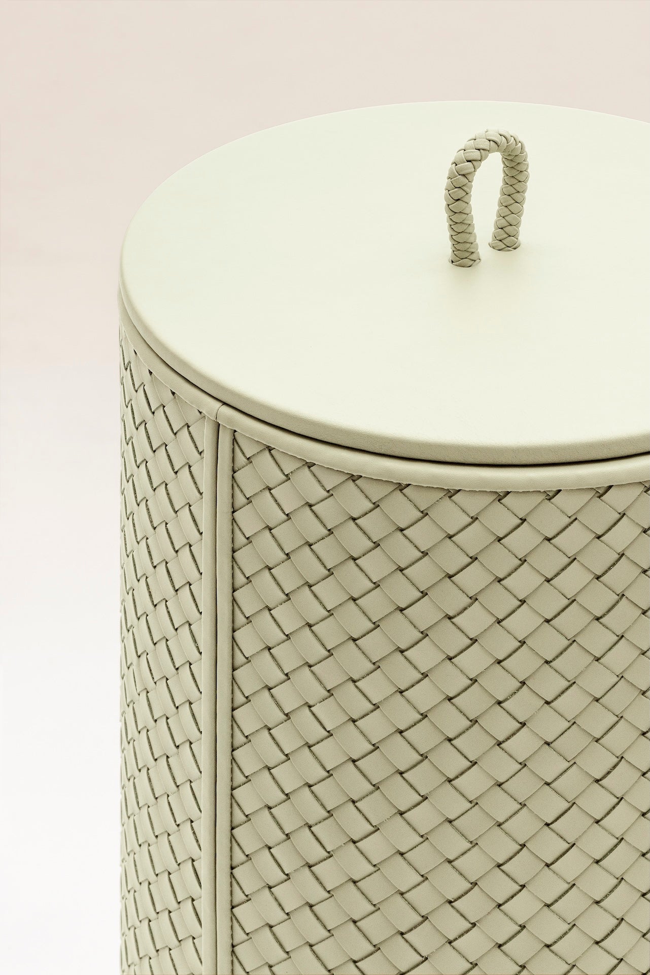 Riviere Ivo | Round Bin: Leather with varnished wood lining, offered in handwoven, herringbone, diamond, or lines quilted patterns, in two height options, with matching lid and acrylic lining accessories | Office + Tech / Bins | 2Jour Concierge, your luxury lifestyle shop | luxury interiors, hospitality décor, elegant living, designer office accessories, boutique hotels, refined lifestyle, yacht décor, executive interiors