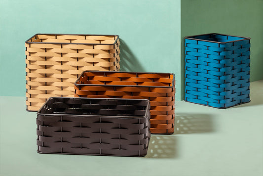 Rudi Nassa | Basket: Regenerated leather with woven structure, dark-stained aluminum frame, and smooth, matte finish, ideal for storing laundry, towels, or magazines, suitable for indoor or outdoor use | Storage / Storage Baskets & Boxes | 2Jour Concierge, your luxury lifestyle shop