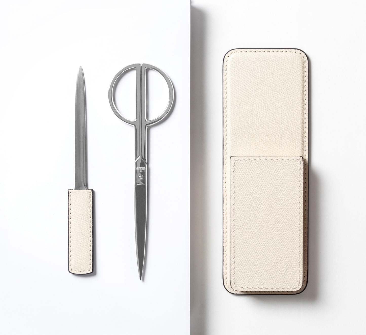 Giobagnara Charles Scissors + Paper Knife Set In Leather-Covered Wood Leather Case | Elegant and Practical Design | Crafted from High-Quality Leather and Wood | Features Two Spaces to Hold Scissors and a Paper Knife | Perfect for Office or Home Use | Explore a Range of Luxury Desk Accessories at 2Jour Concierge, #1 luxury high-end gift & lifestyle shop