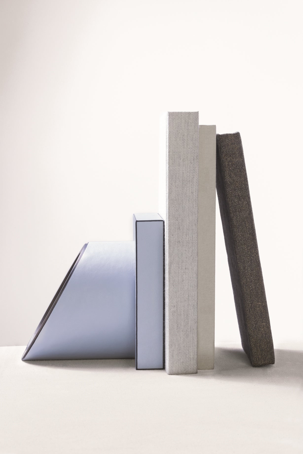 Giobagnara x Stéphane Parmentier Rotunda Brass Cylinder Bookend With Leather-Covered Square | Unique Collaboration with Rotunda Collection | Stylish Design with Brass Cylinder and Leather-Covered Square | Explore a Range of Luxury Home Accessories at 2Jour Concierge, #1 luxury high-end gift & lifestyle shop