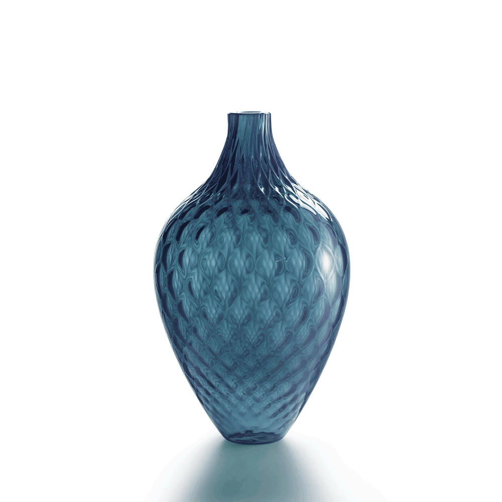 NasonMoretti Samarcanda Murano Glass Vase | A voluptuous balloon-textured vase crafted in Murano glass, designed by NasonMoretti | Featuring a bold silhouette and organic surface, this decorative piece merges traditional craftsmanship with modern flair | Available in a curated palette of rich hues including ruby red, avio blue, pine green, violet, and more | Offered in two sizes: medium and large | A striking sculptural accent for refined interiors | Design by NasonMoretti | Tableware & decorative objects |