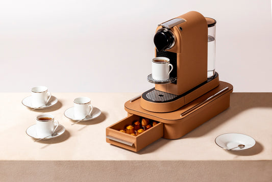 Pigment France by Giobagnara Saint-Germain Compact Coffee Drawer Organizer for Classic Capsules | Leather-covered wood structure with metal inserts available in chrome, bronze, or brass finishes | Features inner walnut wood partitions to host 10 Nespresso classic capsules | Kitchen Accessories | 2Jour Concierge, your luxury lifestyle shop