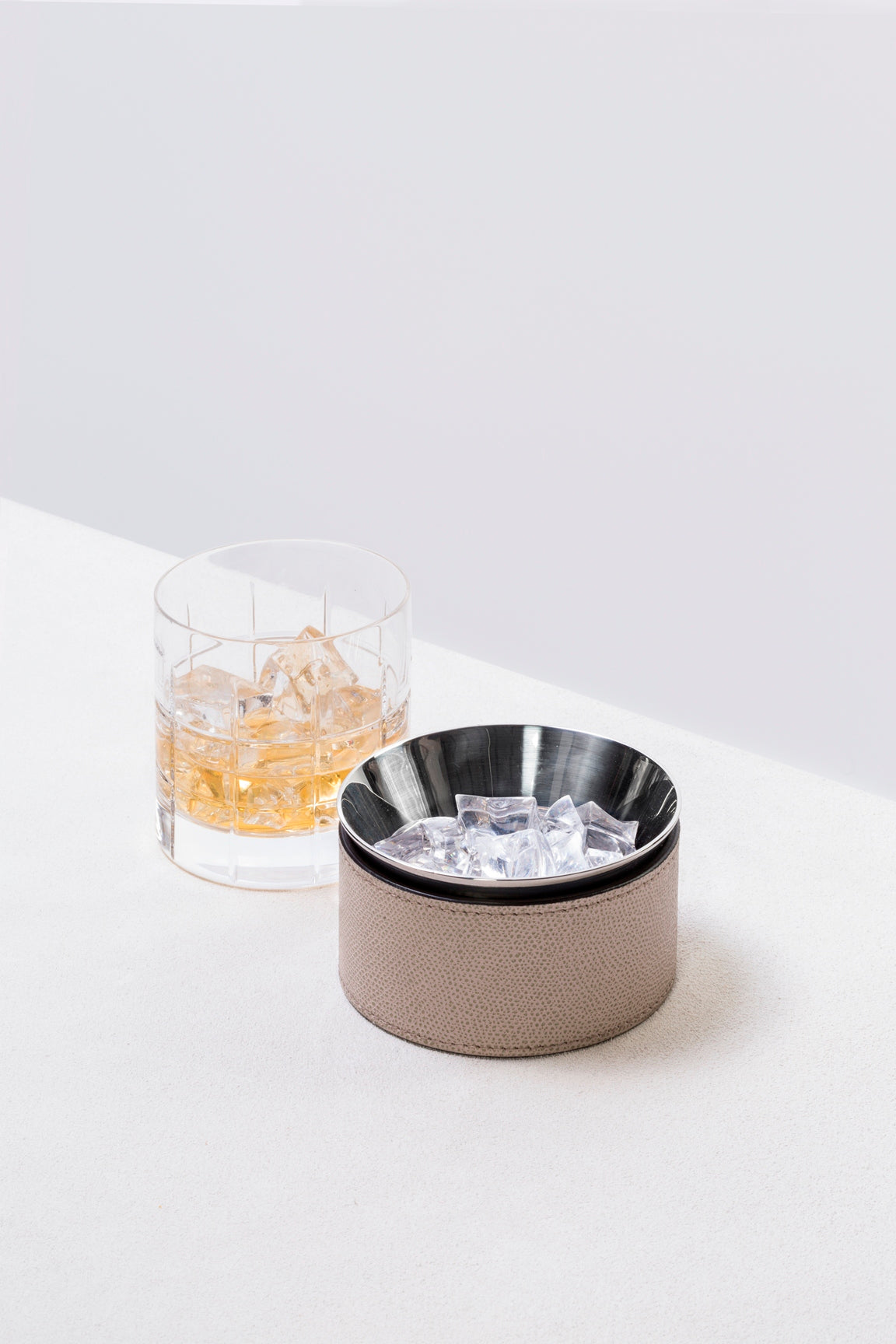 Giobagnara Calypso Bowl | Double-wall stainless steel bowl with removable leather cover, ideal as a sugar bowl or for serving cocktail nibbles, snacks, and ice cream (dishwasher-safe once cover is removed) | Crafted in Italy by Giobagnara | Serveware & Accessories / Bowls & Containers | 2Jour Concierge, your luxury lifestyle shop