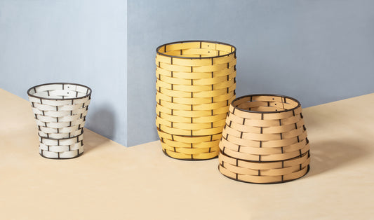 Nassa Storage Basket: Dark-Stained Aluminum Framework, Regenerated Leather Weaving, Tapered Round