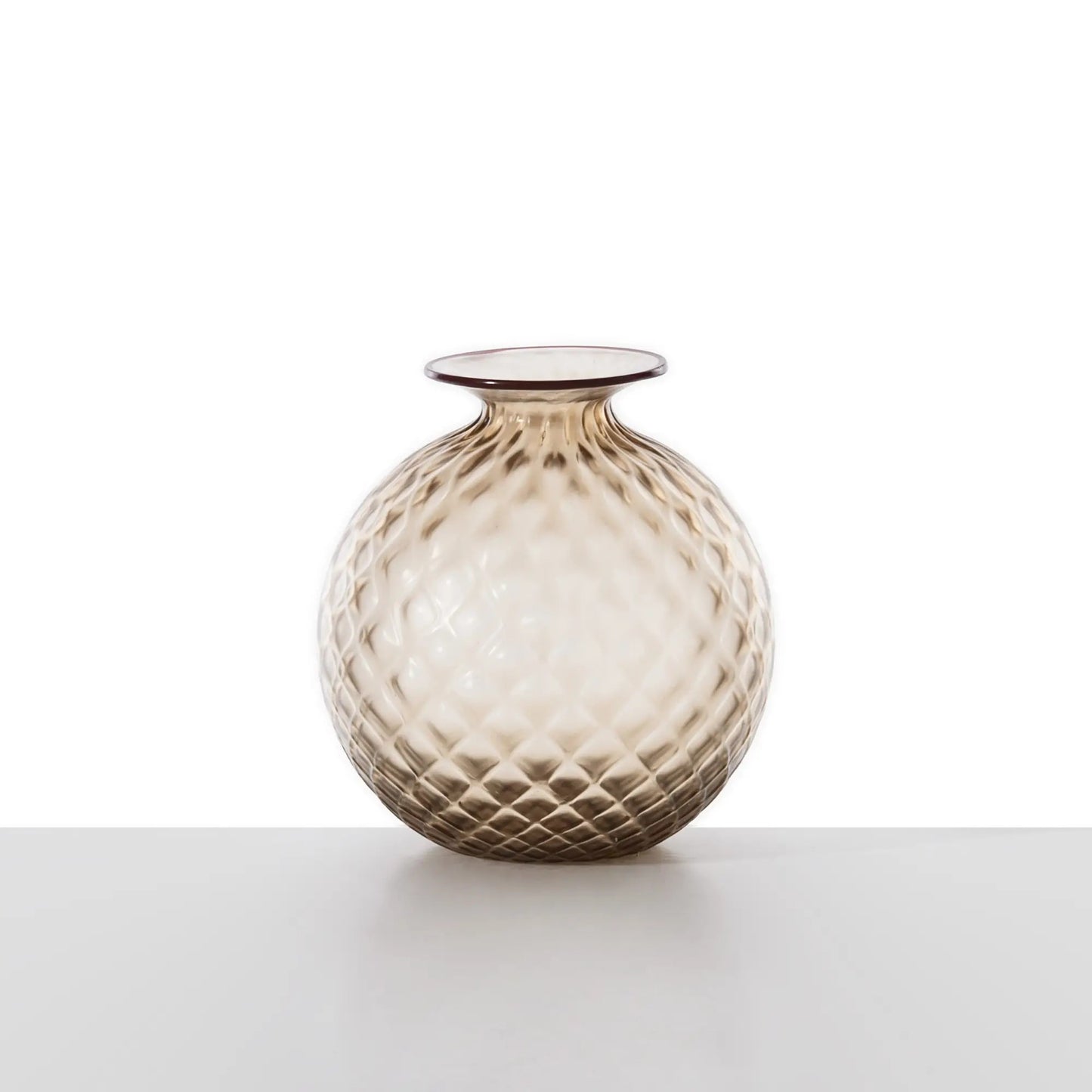 Venini Monofiore Balloton Vase | A delicate Murano glass vase recalling ancient treasures and refined personal keepsakes | Hand-blown with the distinctive balloton texture and crowned by a floret-like stopper | First created in 1970, this piece evokes the elegance and intimacy of vintage perfume vials | A poetic accent for sophisticated interiors | Design by Venini | Tableware & decorative objects | 2Jour Concierge, your luxury lifestyle shop