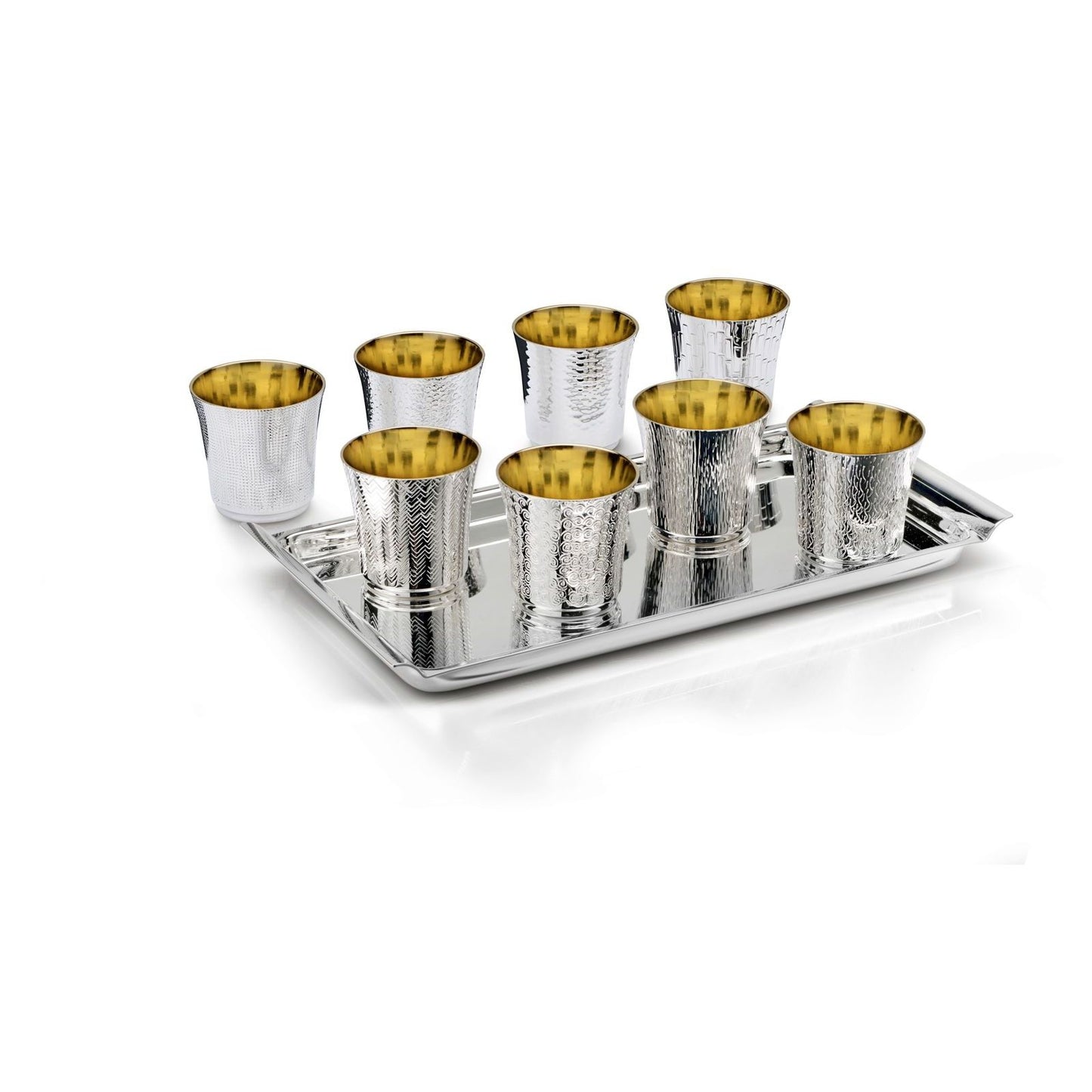 Zanetto Scacciapensieri Liquor Shot Set | Liquor Shot Set: eight shot glasses with gilded interiors, each in a unique texture, presented on a smooth tray; available in three finish options—09615: silver-plated glasses with silver-plated tray; 09615R: silver-plated glasses with platinum-plated tray; 19615: sterling silver glasses with sterling silver tray | Tableware & Drinkware / Spirit Glasses | 2Jour Concierge, your luxury lifestyle shop