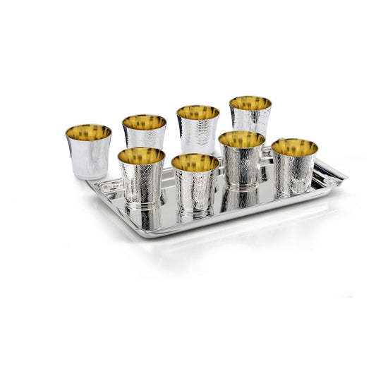 Zanetto Scacciapensieri Liquor Shot Set | Liquor Shot Set: eight shot glasses with gilded interiors, each in a unique texture, presented on a smooth tray; available in three finish options—09615: silver-plated glasses with silver-plated tray; 09615R: silver-plated glasses with platinum-plated tray; 19615: sterling silver glasses with sterling silver tray | Tableware & Drinkware / Spirit Glasses | 2Jour Concierge, your luxury lifestyle shop