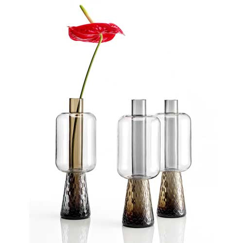 NasonMoretti Ensemble table lamp | Handcrafted in Murano glass with balloon texture and ancient crystal lightness | A poetic design by Elena Salmistraro, celebrating the beauty of everyday objects through interlocks and overlaps | Earth-toned glass base in grey or brown paired with a clear glass diffuser evokes a natural elegance | A sculptural lighting piece that blends function with artistry | Home lighting & decor | 2Jour Concierge, your luxury lifestyle shop