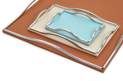 Pinetti Wave | Leather & Sculpted Metal Trays: Leather-covered tray with sculpted chrome, burnished, or gold handles, available in square and rectangular formats | Tabletop & Bar / Trays | 2Jour Concierge, your luxury lifestyle shop | luxury interiors, refined dining, elegant serving accessories, boutique hotels, contemporary décor, yacht décor, office décor, hospitality décor