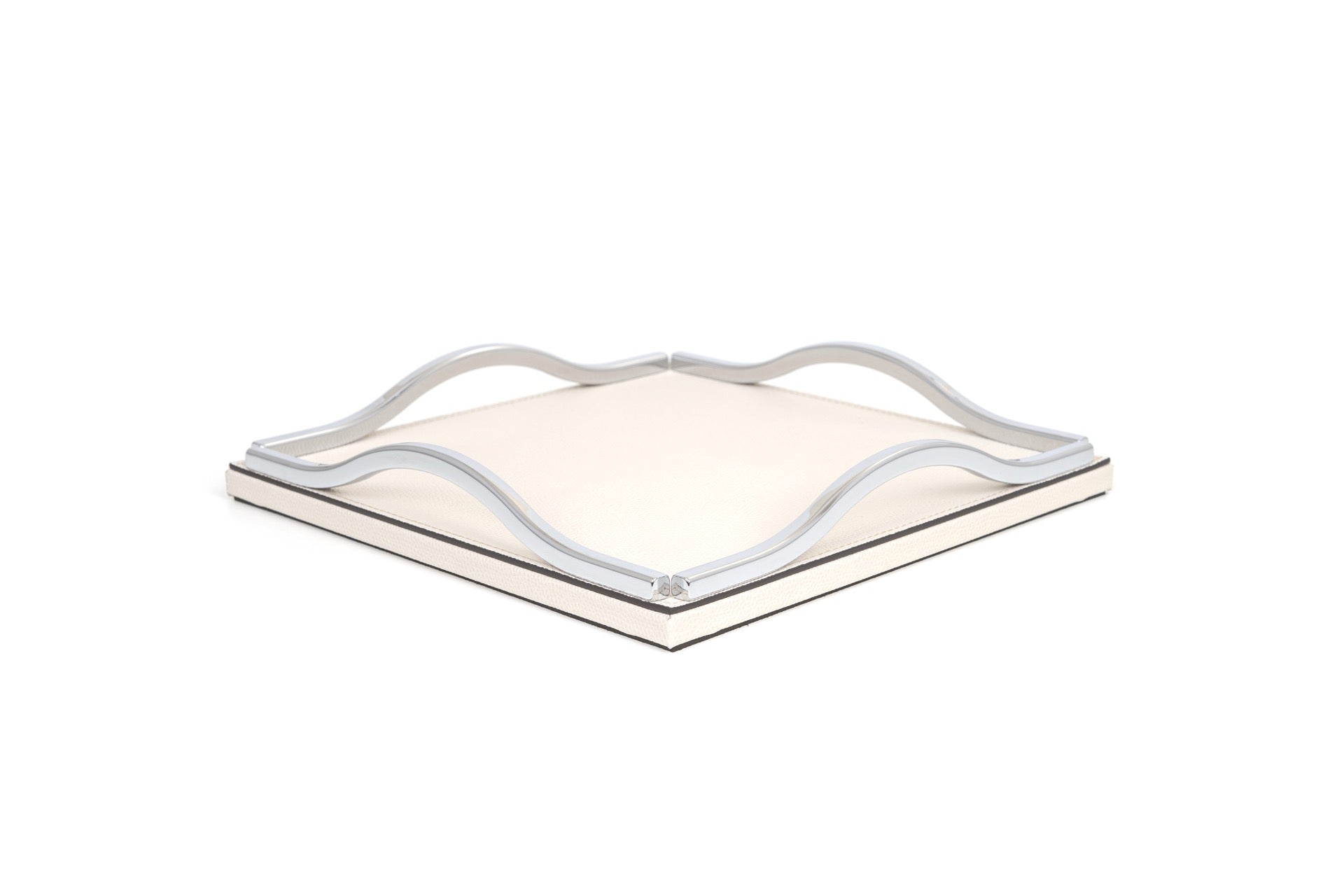 Pinetti Wave | Leather & Sculpted Metal Trays: Leather-covered tray with sculpted chrome, burnished, or gold handles, available in square and rectangular formats | Tabletop & Bar / Trays | 2Jour Concierge, your luxury lifestyle shop | luxury interiors, refined dining, elegant serving accessories, boutique hotels, contemporary décor, yacht décor, office décor, hospitality décor