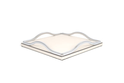 Pinetti Wave | Leather & Sculpted Metal Trays: Leather-covered tray with sculpted chrome, burnished, or gold handles, available in square and rectangular formats | Tabletop & Bar / Trays | 2Jour Concierge, your luxury lifestyle shop | luxury interiors, refined dining, elegant serving accessories, boutique hotels, contemporary décor, yacht décor, office décor, hospitality décor