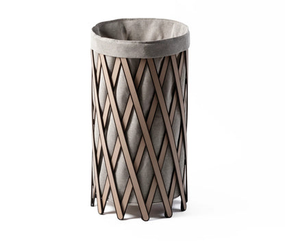 Safari Laundry Basket by Pinetti | Wooden foldable structure covered with leather | Inside fabric in linen and cotton is removable and washable | Designer: Antonio De Marco | Home Organization and Laundry Baskets | 2Jour Concierge, your luxury lifestyle shop