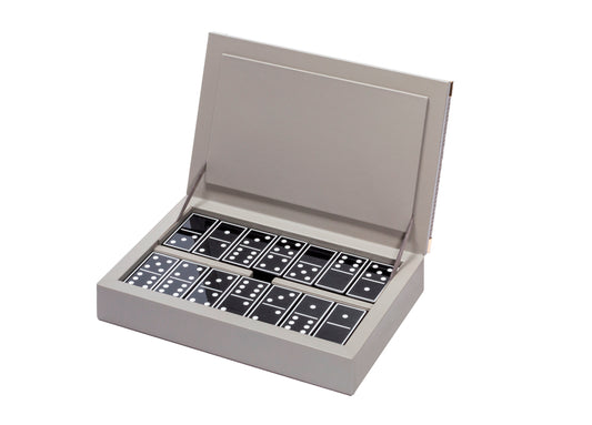 Riviere Thea Leather-Covered Domino Game Set With Braided Trim | Stylish Design with Braided Leather Trim and Metal Details | Set Equipped with Highly Resistant Glossy Plexiglass Domino Pieces | Choose Between Black or White Finish | Explore a Range of Luxury Domino Game Sets at 2Jour Concierge, #1 luxury high-end gift & lifestyle shop