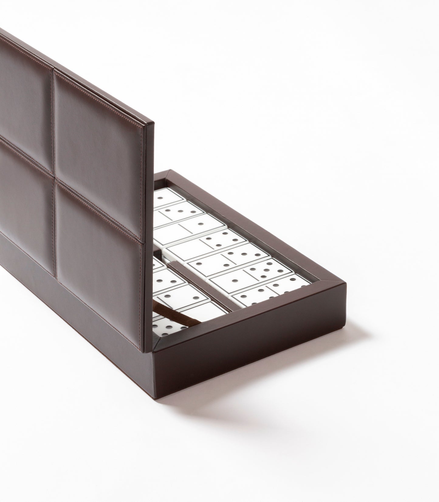 Riviere Eva Classic Domino Game Set in Leather Box With Stitched Padded Finish | Stylish Design with Padded Leather Lid | Set Equipped with Highly Resistant Glossy Plexiglass Domino Pieces | Choose Between Black or White Finish | Explore Luxury Domino Game Sets at 2Jour Concierge, #1 luxury high-end gift & lifestyle shop