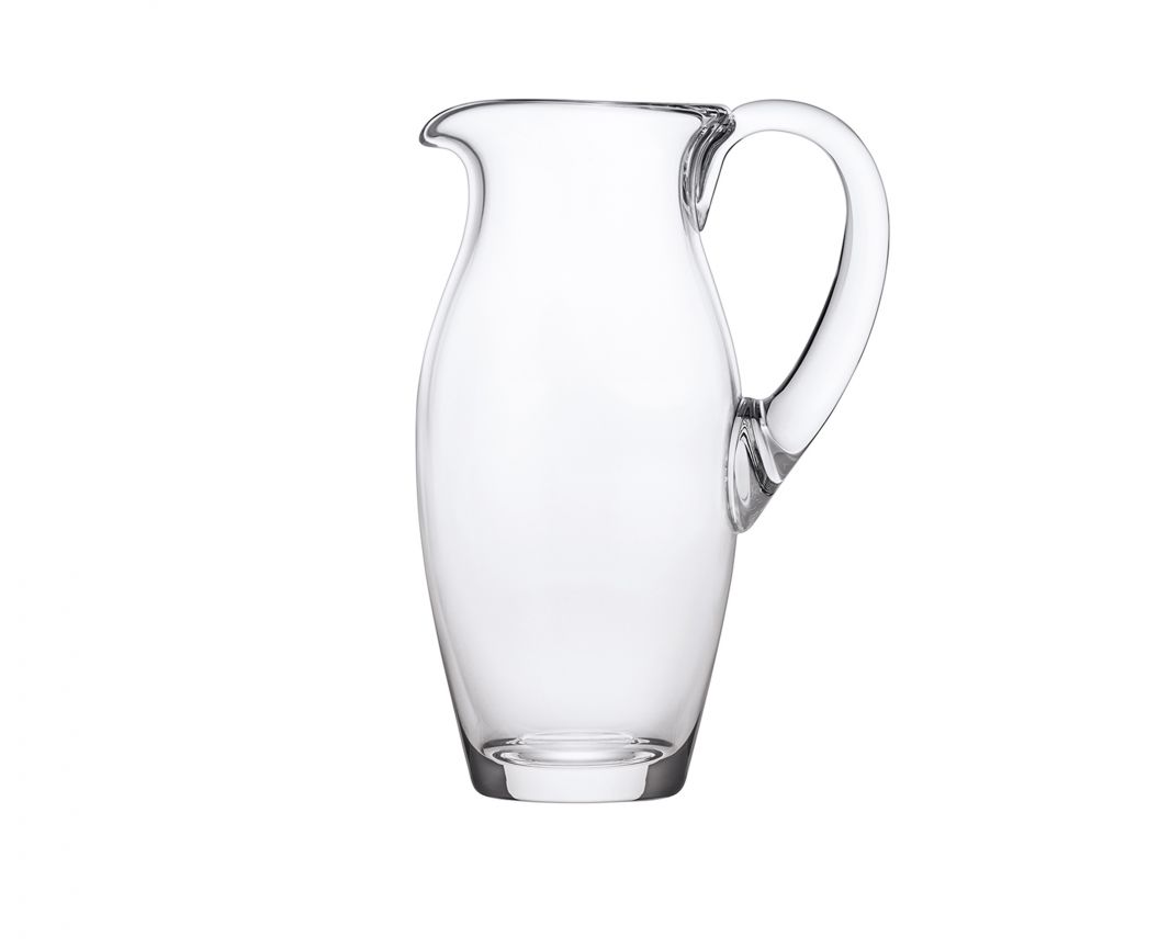 Amadeus Water Jug by Saint-Louis | Ode to the expertise and purity of crystal coloring | Represents the palette of Saint-Louis crystal hues and the perfection of its clear crystal | Elegant design with curves and slender stem | Rounded gob on a slender drawn leg | Pays homage to Wolfgang Amadeus Mozart | Collection: Amadeus | Color: Clear | Design: Timeless | Tableware and Water Jugs | 2Jour Concierge, your luxury lifestyle shop