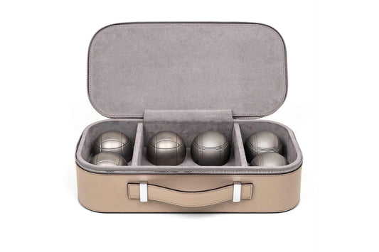 Pinetti Petanque Game Set in Leather-Covered Case | A complete game set of 6 metal balls with one jack and a leather measuring rope | Portable Pétanque game set comes with its own sleek storage box, completely covered with genuine grained leather | Explore Luxury Game Sets at 2Jour Concierge, #1 luxury high-end gift & lifestyle shop
