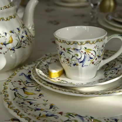 Gien Toscana | US Tea Cup & Saucer: Fine earthenware with Renaissance floral motif and smooth, glazed finish, ideal for serving tea or light coffee in a generous format | Tableware & Serveware / Cups & Mugs | 2Jour Concierge, your luxury lifestyle shop