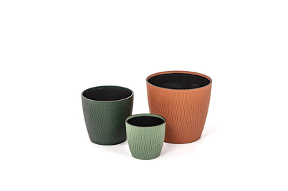 Pinetti Silvy Plastic Flower Pot With Removable Regenerated Leather Cover | Plastic structure with removable leather cover | Available in six different dimensions, with the three larger sizes featuring wheels for easy mobility | Explore Luxury Lifestyle Accessories at 2Jour Concierge, #1 luxury high-end gift & lifestyle shop