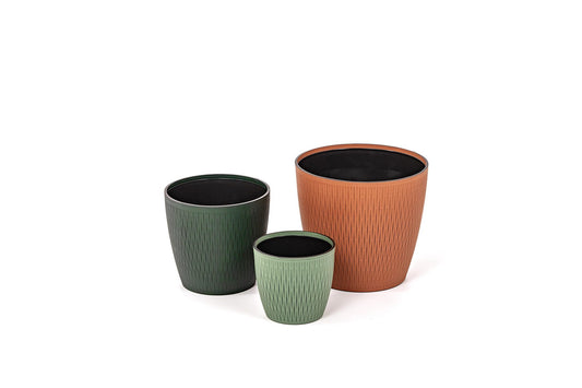 Pinetti Silvy Plastic Flower Pot With Removable Regenerated Leather Cover | Plastic structure with removable leather cover | Available in six different dimensions, with the three larger sizes featuring wheels for easy mobility | Explore Luxury Lifestyle Accessories at 2Jour Concierge, #1 luxury high-end gift & lifestyle shop