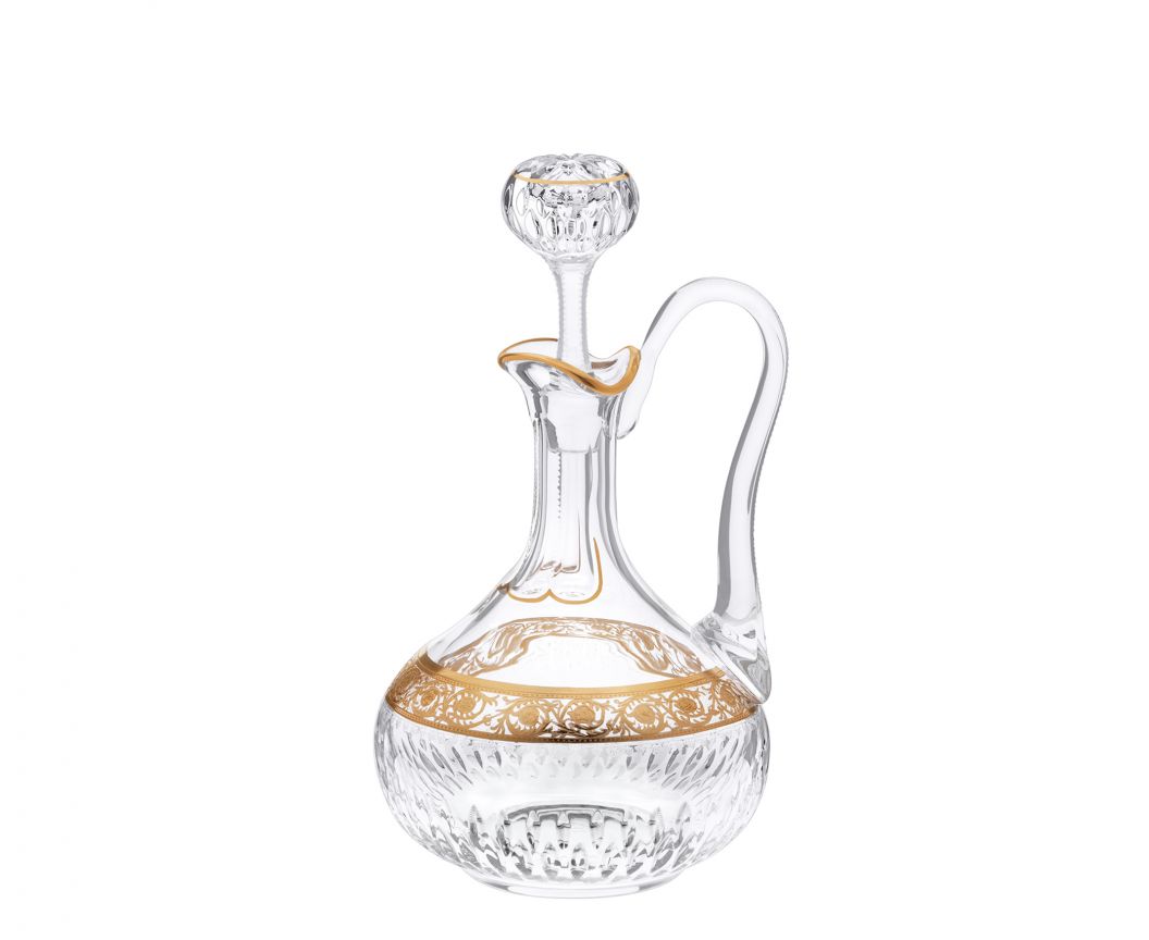 Thistle Crystal Wine Decanter With A Handle by Saint-Louis | Inspired by the Chardon service from 1913 | Features a plant motif engraved frieze decorated in fine gold | Venetian-style stripes, bevel cuts, and 24-carat gold or platinum decoration | Collection: Thistle | Color: Clear | Design: Timeless | Tableware and Decanters | 2Jour Concierge, your luxury lifestyle shop