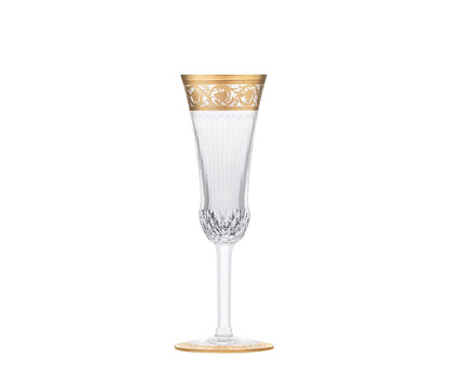 Thistle Crystal Champagne Flute by Saint-Louis | Inspired by the Chardon service from 1913 | Features a plant motif engraved frieze decorated in fine gold | Venetian-style stripes, bevel cuts, and 24-carat gold or platinum decoration | Collection: Thistle | Color: Clear | Design: Timeless | Tableware and Champagne Flutes | 2Jour Concierge, your luxury lifestyle shop