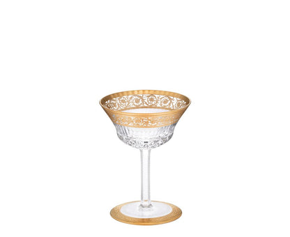 Thistle Crystal Champagne Cup by Saint-Louis | Inspired by the Chardon service from 1913 | Features a plant motif engraved frieze decorated in fine gold | Venetian-style stripes, bevel cuts, and 24-carat gold or platinum decoration | Collection: Thistle | Color: Clear | Design: Timeless | Tableware and Champagne Cups | 2Jour Concierge, your luxury lifestyle shop