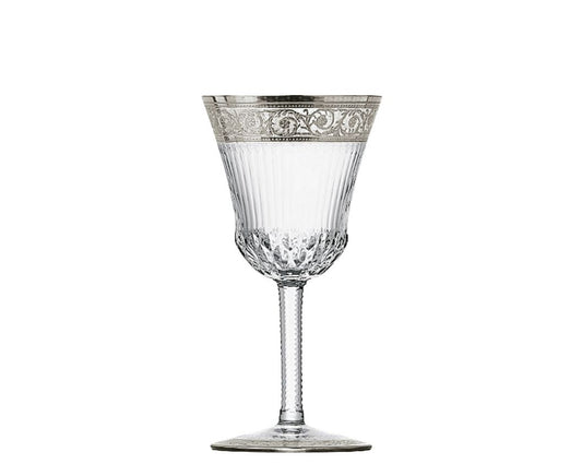 Thistle Water Glass by Saint-Louis | Inspired by the Chardon service from 1913 | Features a plant motif engraved frieze decorated in fine gold | Venetian-style stripes, bevel cuts, and 24-carat gold or platinum decoration | Collection: Thistle | Color: Clear | Design: Timeless | Tableware and Water Glasses | 2Jour Concierge, your luxury lifestyle shop