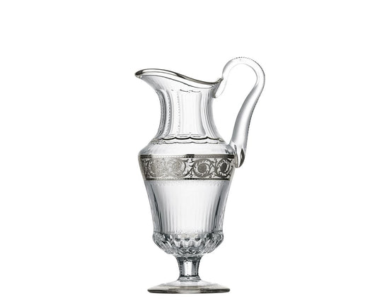 Thistle Water Jug by Saint-Louis | Inspired by the Chardon service from 1913 | Features a plant motif engraved frieze decorated in fine gold | Venetian-style stripes, bevel cuts, and 24-carat gold or platinum decoration | Collection: Thistle | Color: Clear | Design: Timeless | Tableware and Water Jugs | 2Jour Concierge, your luxury lifestyle shop