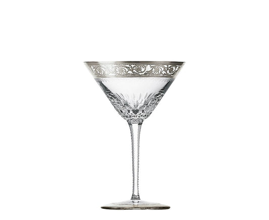Thistle Cocktail Glass Platinum by Saint-Louis | Thistle, inspired by the Chardon service created in 1909 and Anglicized in 1913, features an engraved frieze decorated in fine gold and platinum, adorning the finest tables for over a century. Blown and cut at Saint-Louis-lès-Bitche in Moselle, France. Collection: THISTLE. Color: Clear. Design: Timeless. | Barware and Glassware | 2Jour Concierge, your luxury lifestyle shop