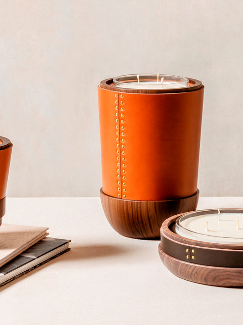 Rabitti 1969 Toiles De Noyer Candle Holders | Crafted from rich walnut wood with fine saddle leather inserts and golden tack details | Available in three sizes for versatile decor | Home Decor | 2Jour Concierge, your luxury lifestyle shop
