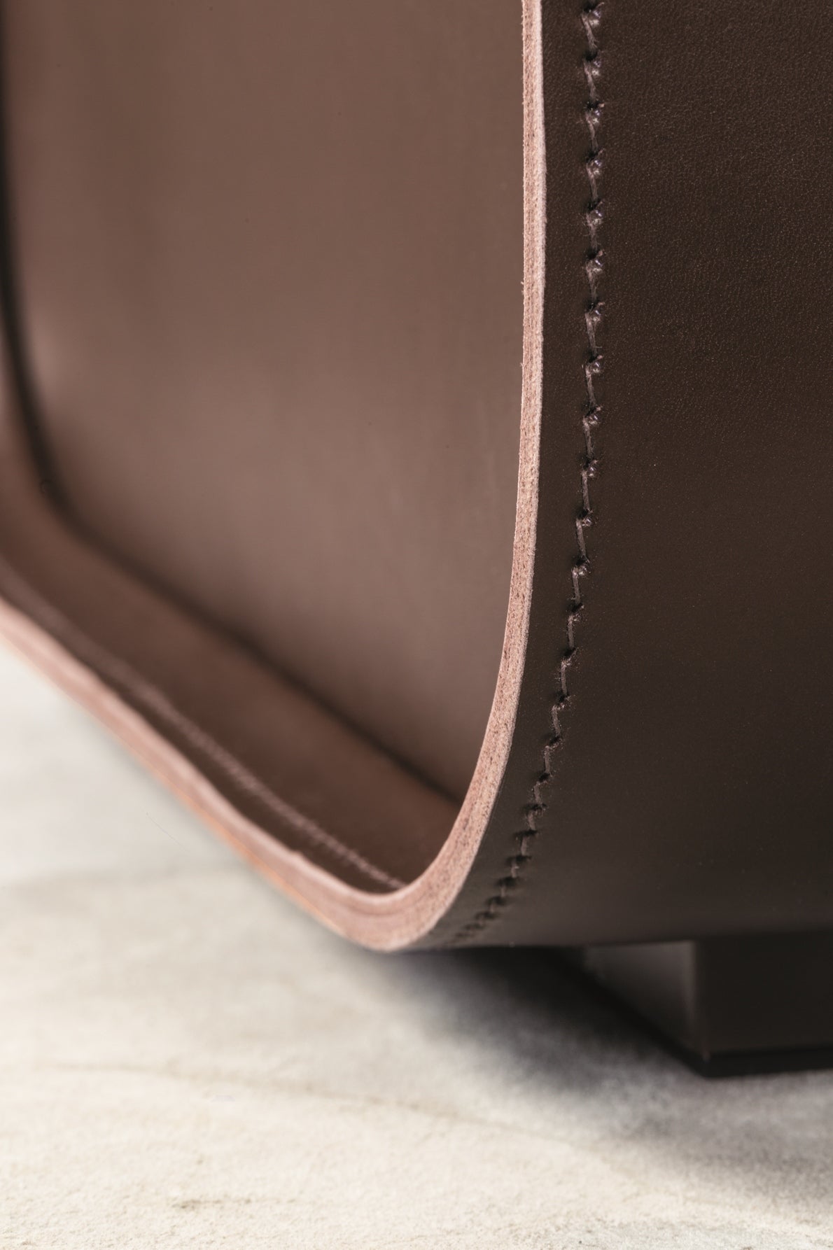 Rabitti 1969 Jota Stool | Water-resistant saddle leather stool with a padded surface | Designed by Stéphane Parmentier | Durable and stylish for both indoor and outdoor use | Home Decor and Furniture | 2Jour Concierge, your luxury lifestyle shop