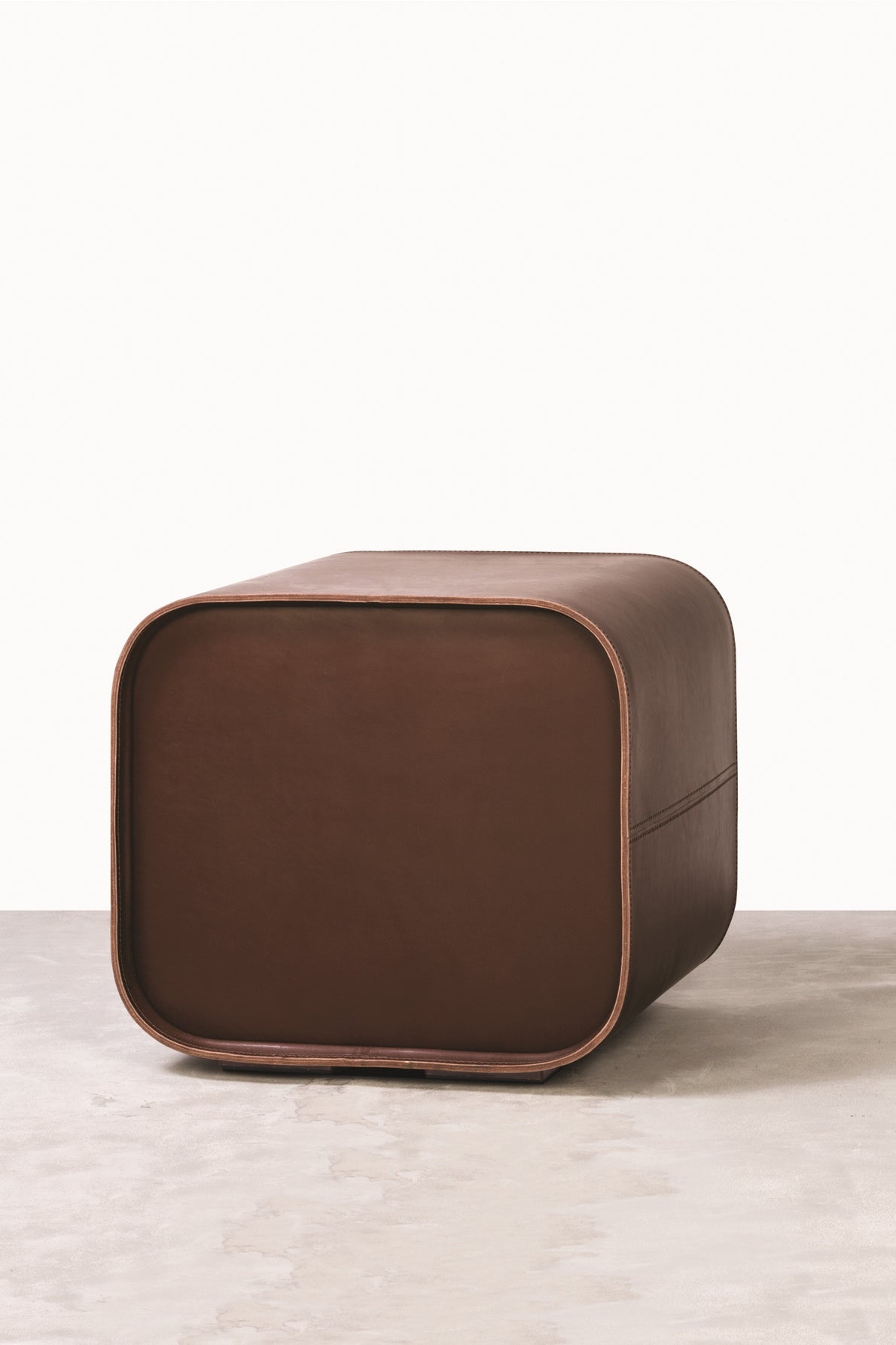 Rabitti 1969 Jota Stool | Water-resistant saddle leather stool with a padded surface | Designed by Stéphane Parmentier | Durable and stylish for both indoor and outdoor use | Home Decor and Furniture | 2Jour Concierge, your luxury lifestyle shop