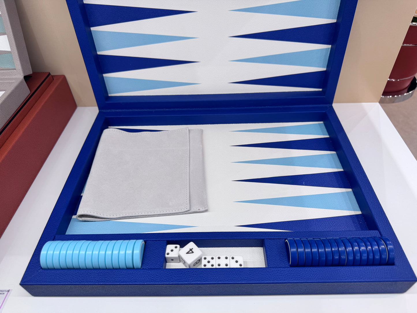 Giobagnara Lerici | Backgammon Set: Leather with high-gloss inlaid playing field, lacquered dice, and resistant acrylic chips, smooth finish | Games / Backgammon Sets | 2Jour Concierge, your luxury lifestyle shop | luxury interiors, hospitality décor, elegant living, designer home accessories, boutique hotels, refined lifestyle, yacht décor, office décor, executive interiors